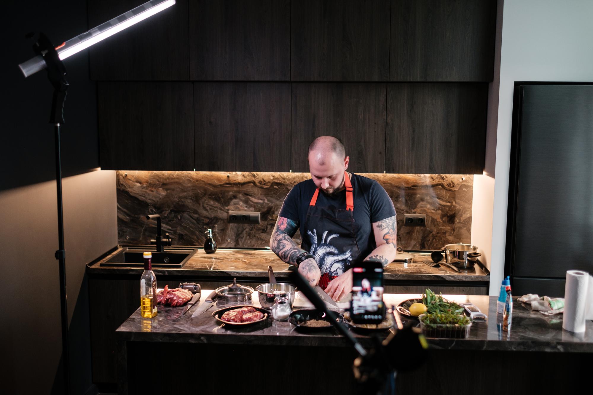 Workshop kitchen with chef at stove